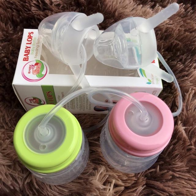 Bình sữa rảnh tay Baby Lops