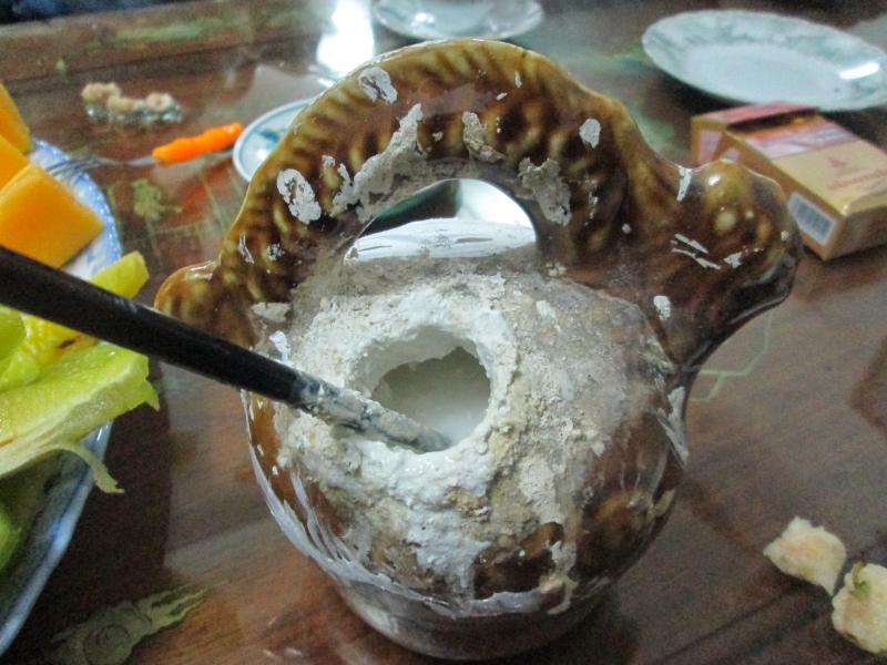 Dùng vôi ăn trầu trị mụn cóc