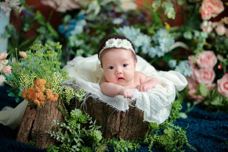 Em bé là niềm vui của cả gia đình