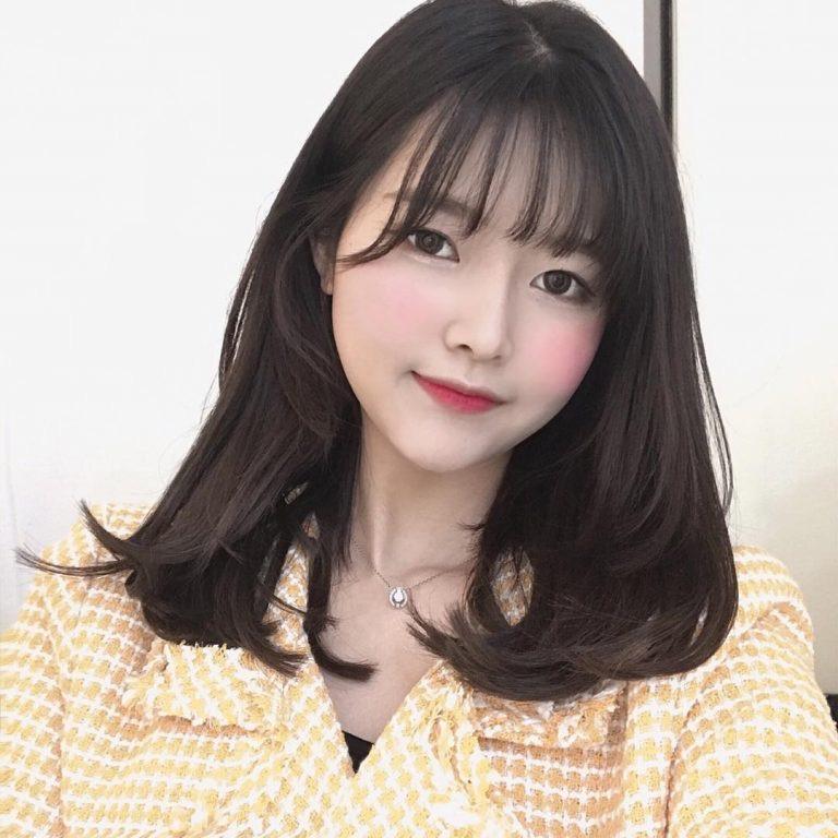 Kiểu tóc dài duỗi phồng cụp thanh lịch