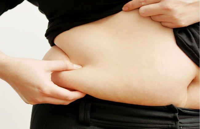 Tăng cân là triệu chứng bình thường ở thời kỳ mãn kinh.