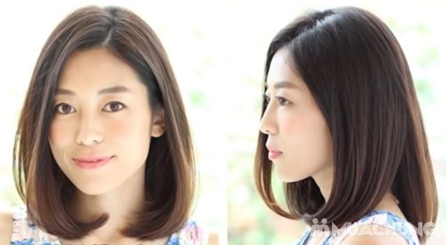 Kiểu tóc ngắn bob uốn cụp ngang vai sẽ giúp gương mặt của bạn thanh thoát hơn
